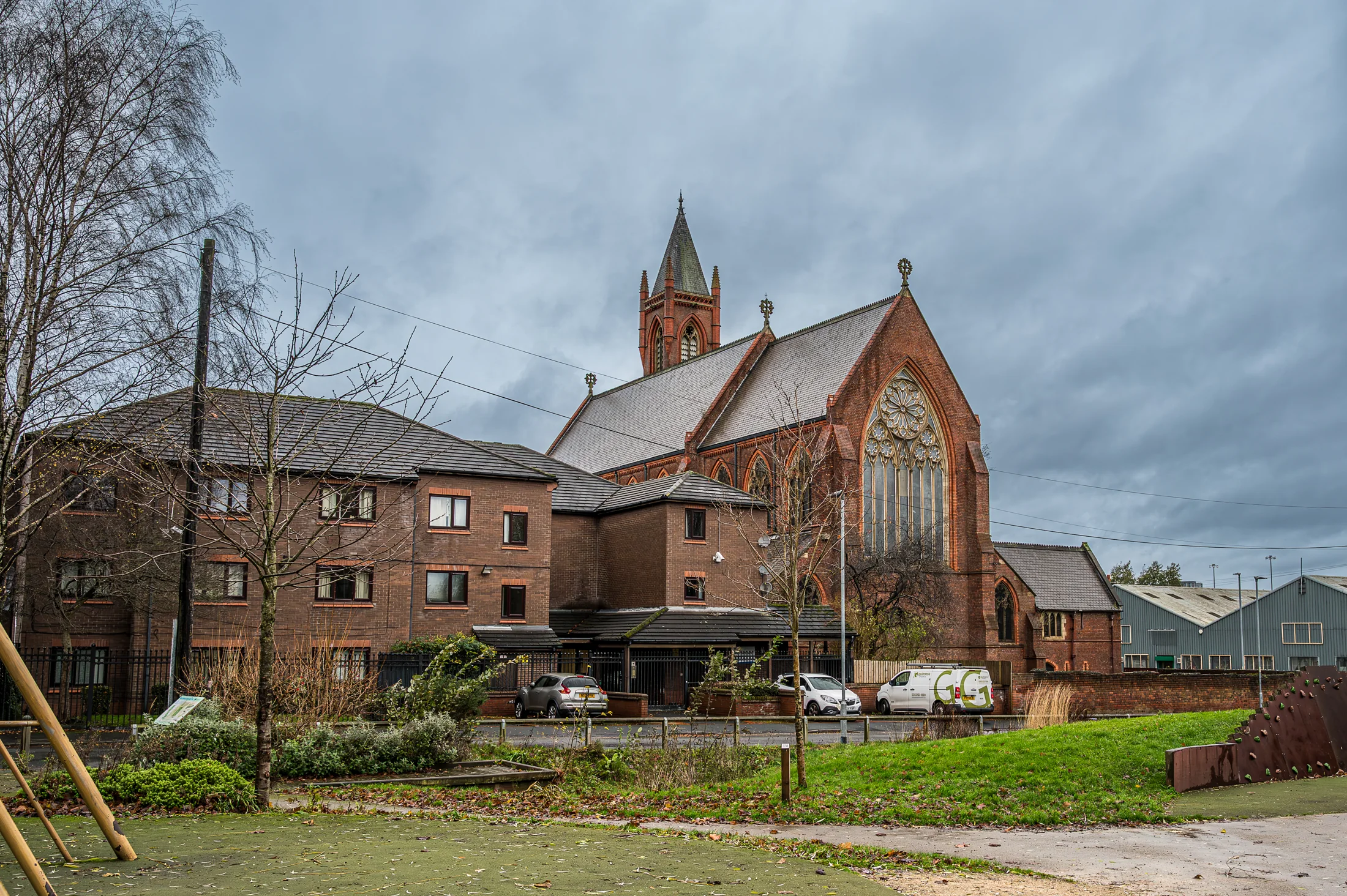 The church seen from a neighbouring green space and play area